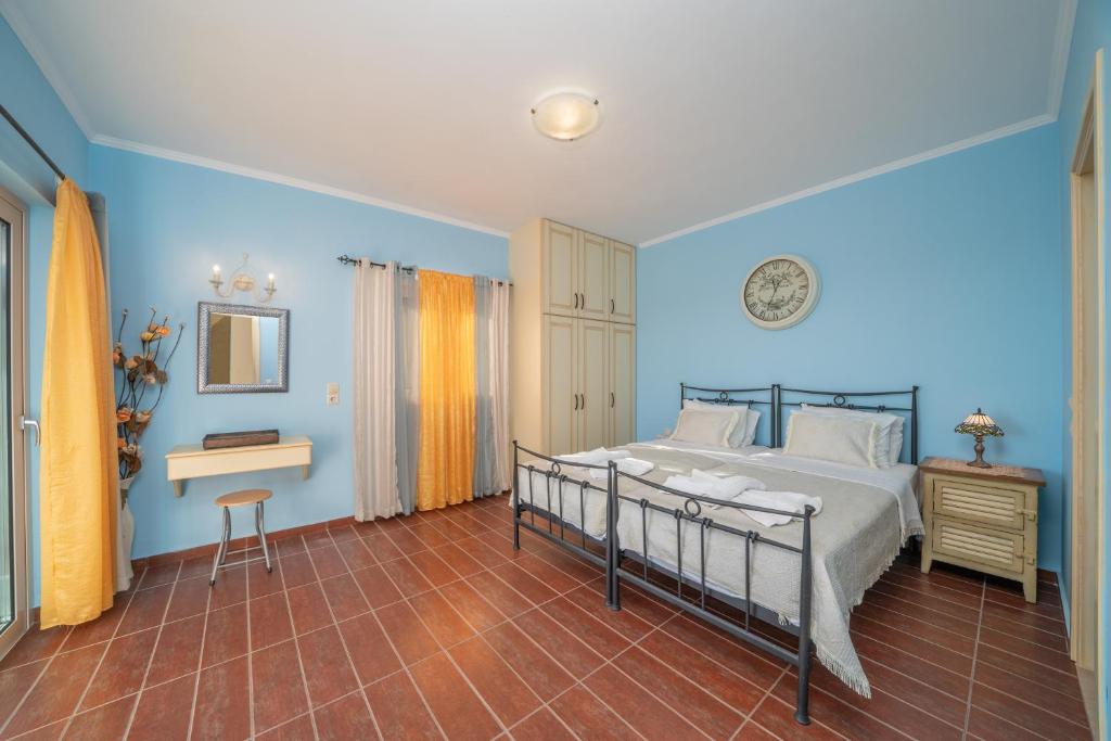 Postel nebo postele na pokoji v ubytování Villa Socrates
