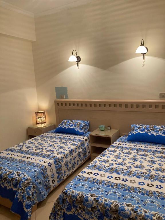 Katil atau katil-katil dalam bilik di Cherry Apartment