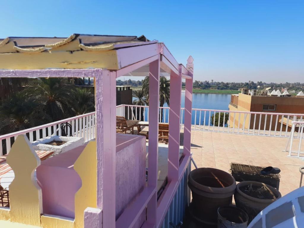 A balcony or terrace at East Luxor Apartments with Nile views