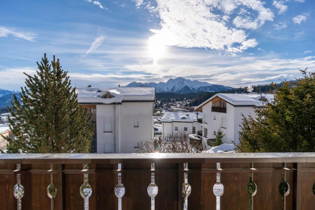 a view from the balcony of a house at Edelweiss Darblauna Sut in Flims
