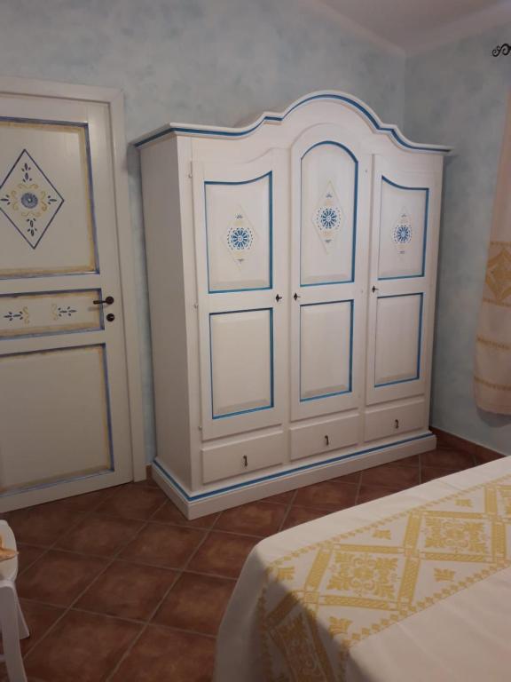 A bed or beds in a room at Le pavoncelle 1