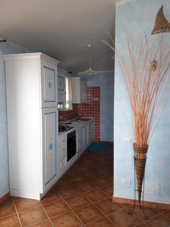 A kitchen or kitchenette at Le pavoncelle 1