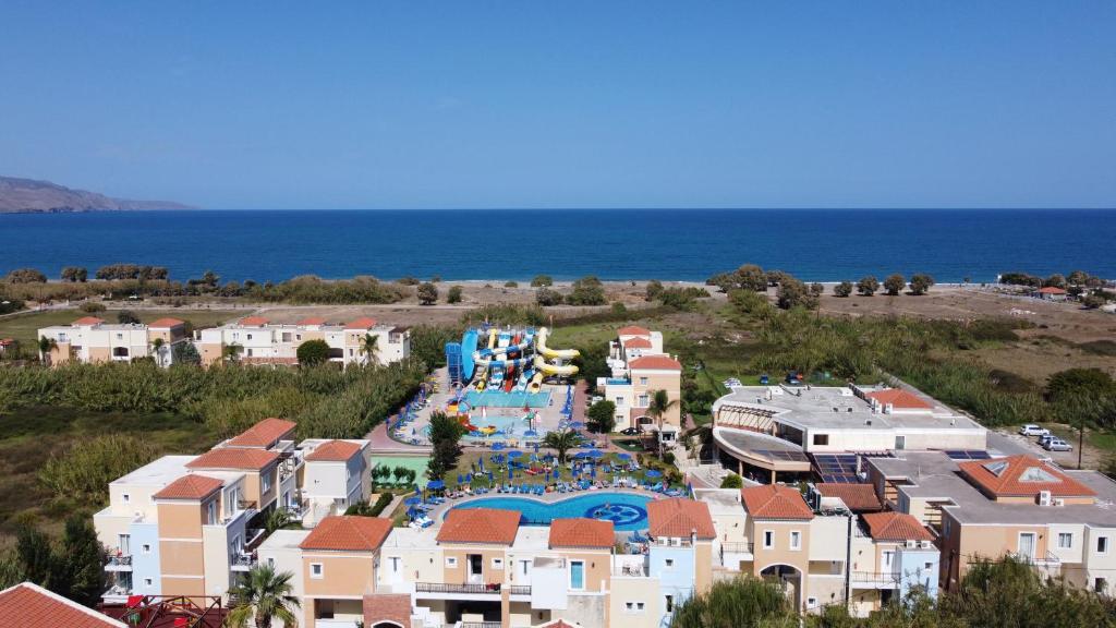 an aerial view of a resort with a water park at Chrispy Waterpark Resort - All inclusive in Kolymvari