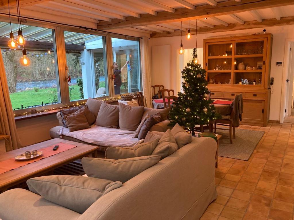 Posezení v ubytování Maison L’ Ambléve