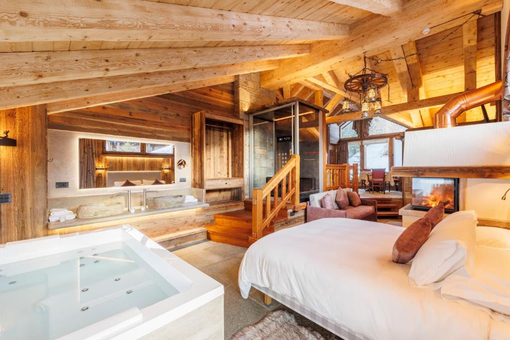 Postel nebo postele na pokoji v ubytování Park Chalet Village