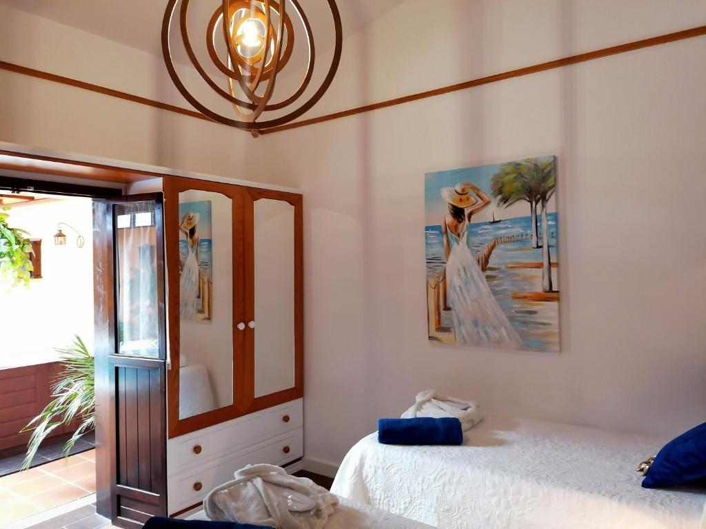 A bed or beds in a room at Villa Spa Las Tinajas