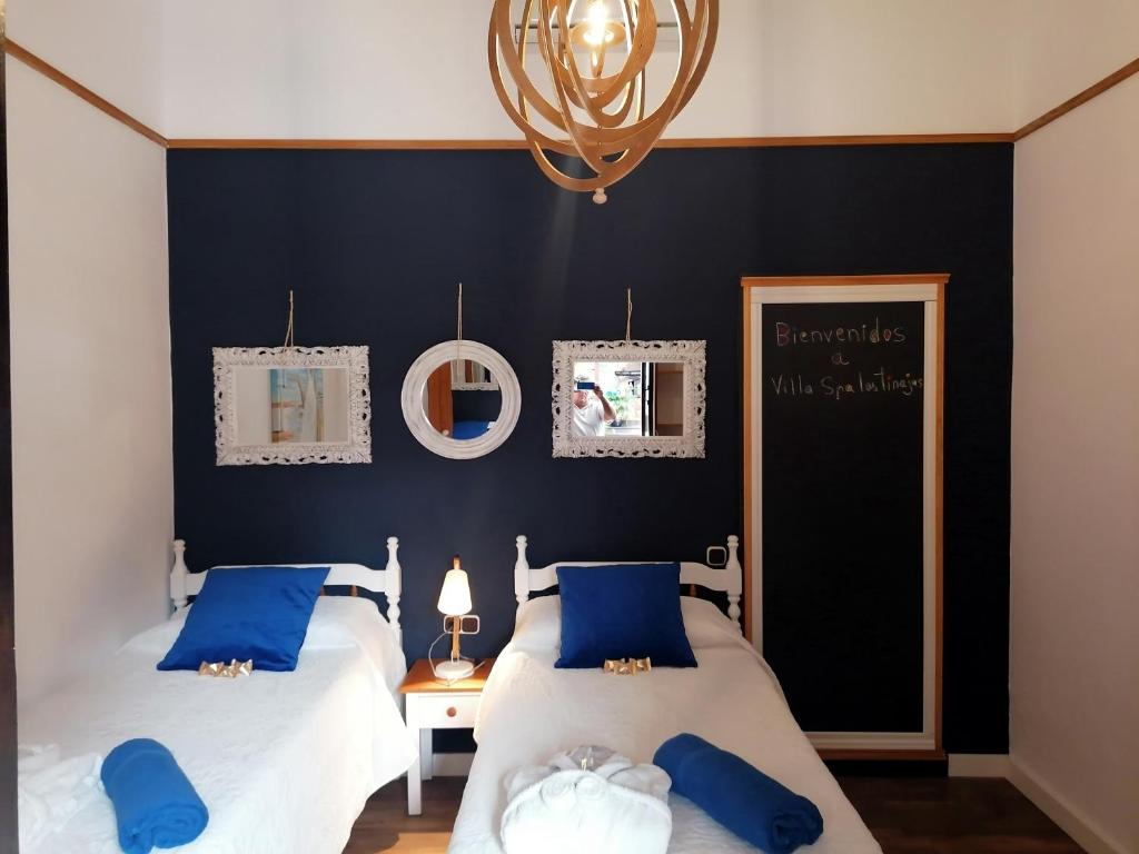 A bed or beds in a room at Villa Spa Las Tinajas