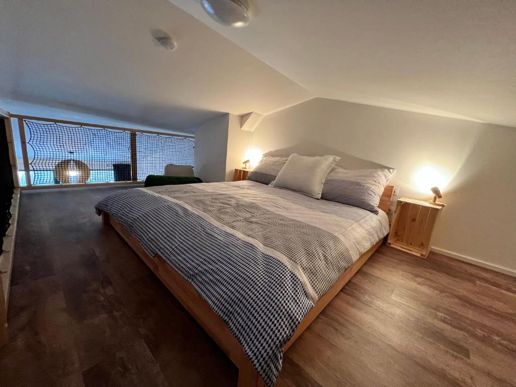 Postel nebo postele na pokoji v ubytování Ubytování Zadov - Apartmán Prenet
