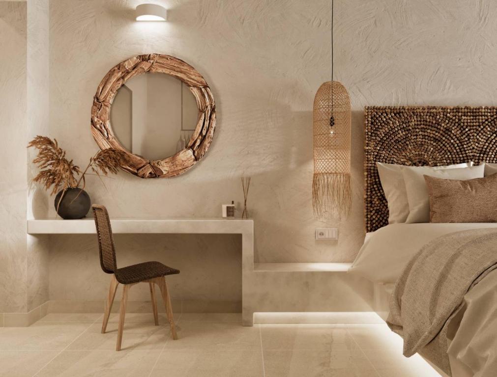 Postel nebo postele na pokoji v ubytování Delfini Beach Hotel & Suites