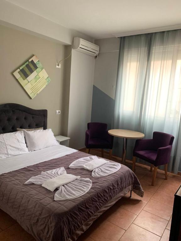 Postel nebo postele na pokoji v ubytování Guest House De Rada