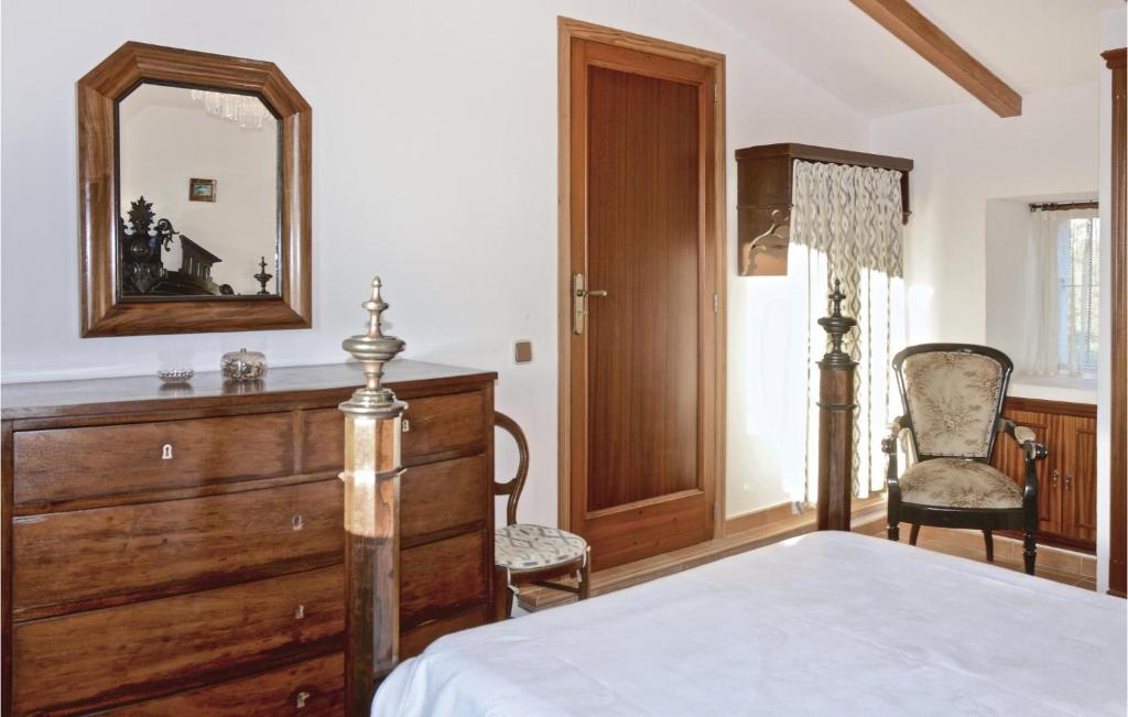 Postel nebo postele na pokoji v ubytování 1 Bedroom Gorgeous Apartment In Selva