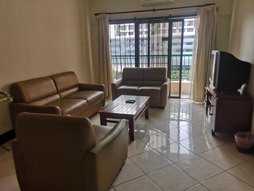 Istumisnurk majutusasutuses Marina Court KK City Homestay