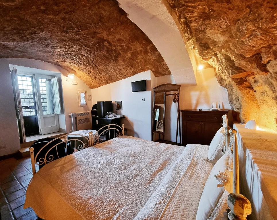 Ένα ή περισσότερα κρεβάτια σε δωμάτιο στο Torretta ai Sassi