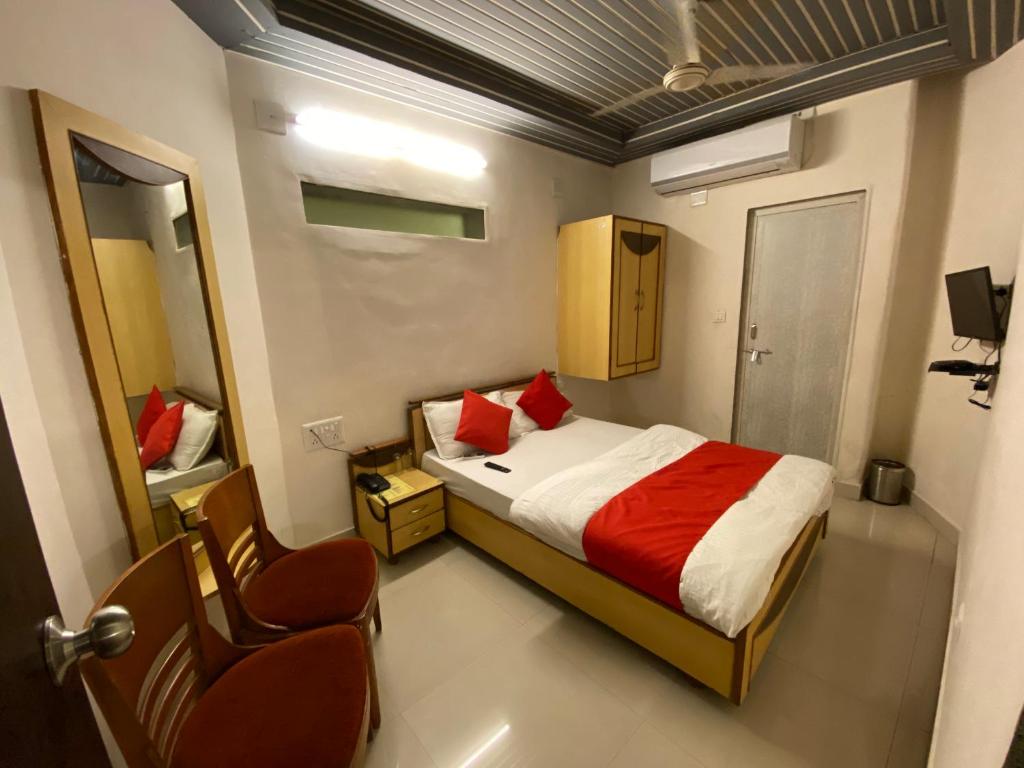 Postel nebo postele na pokoji v ubytování Hotel Riverfront