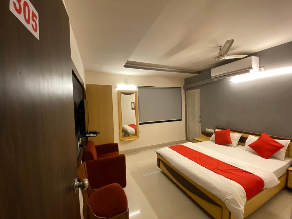 Postel nebo postele na pokoji v ubytování Hotel Riverfront