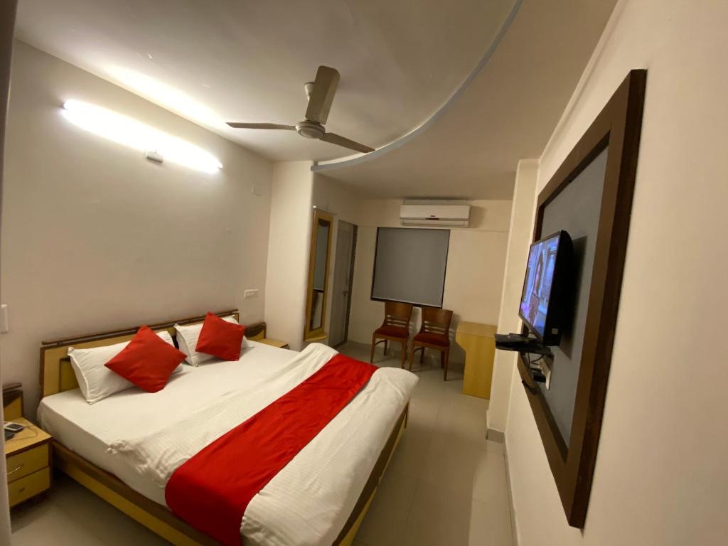 Postel nebo postele na pokoji v ubytování Hotel Riverfront