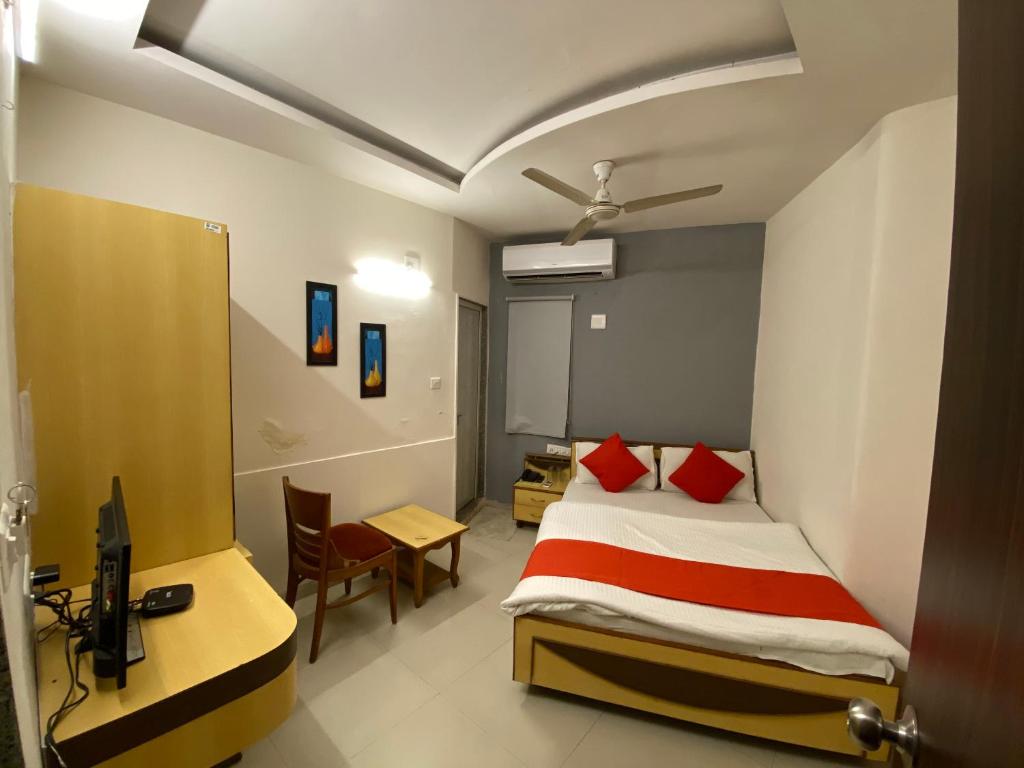 Postel nebo postele na pokoji v ubytování Hotel Riverfront