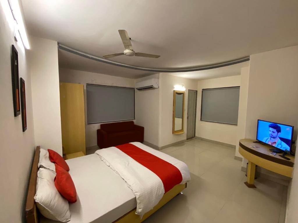 TV a/nebo společenská místnost v ubytování Hotel Riverfront