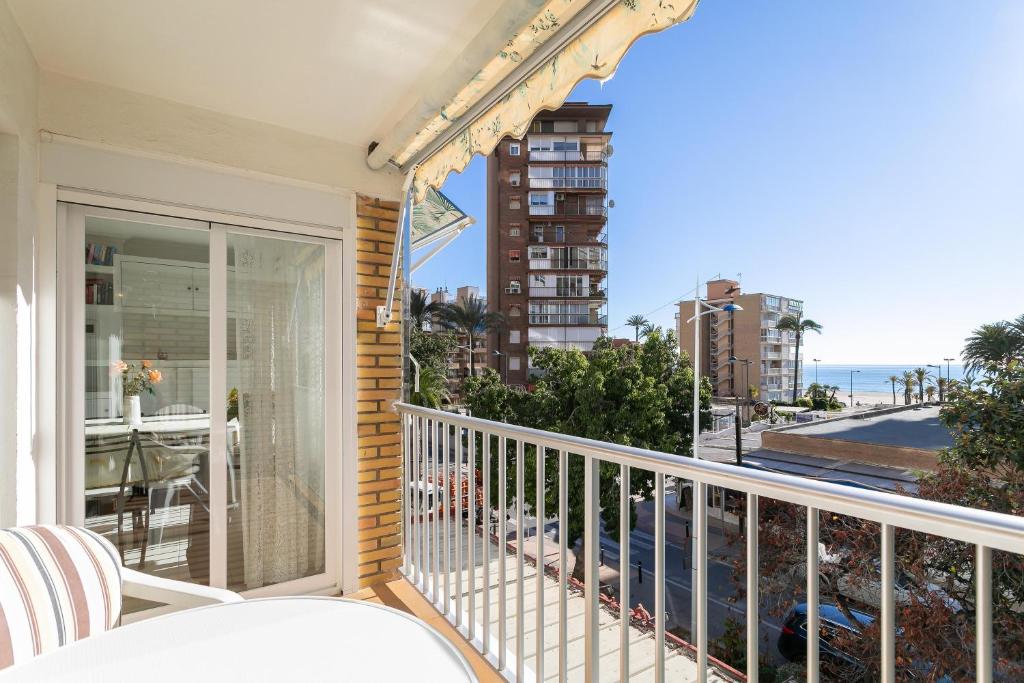 a balcony with a view of the ocean at Aparmento Eolo in Benidorm