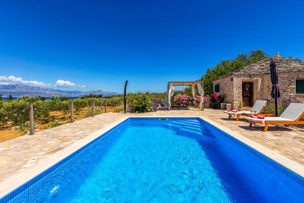 Bazén v ubytovaní Magical Island Home alebo v jeho blízkosti