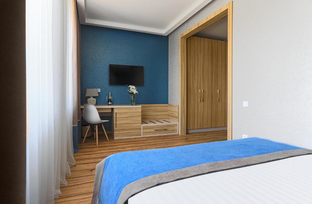 Postel nebo postele na pokoji v ubytování Redling Hotel