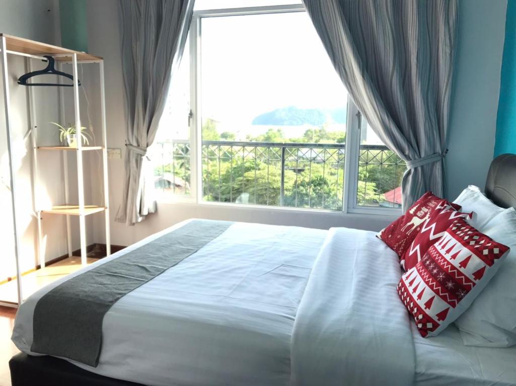 Katil atau katil-katil dalam bilik di Blue Andaman Seaview Families Suite Apartment