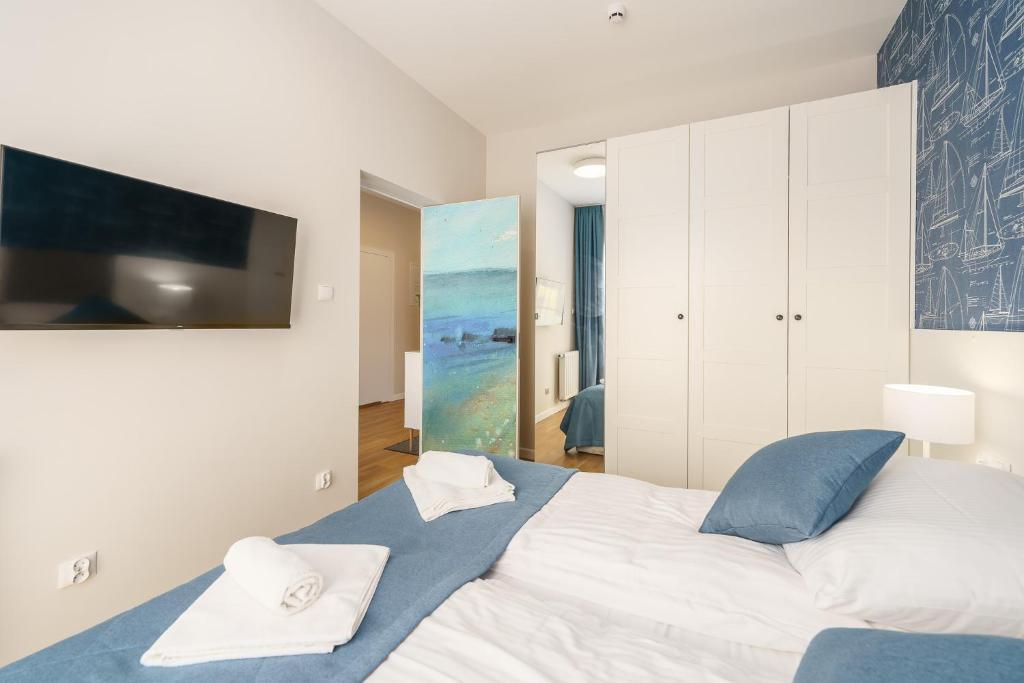 Posteľ alebo postele v izbe v ubytovaní Sunset Resort II, Nadmorska 104