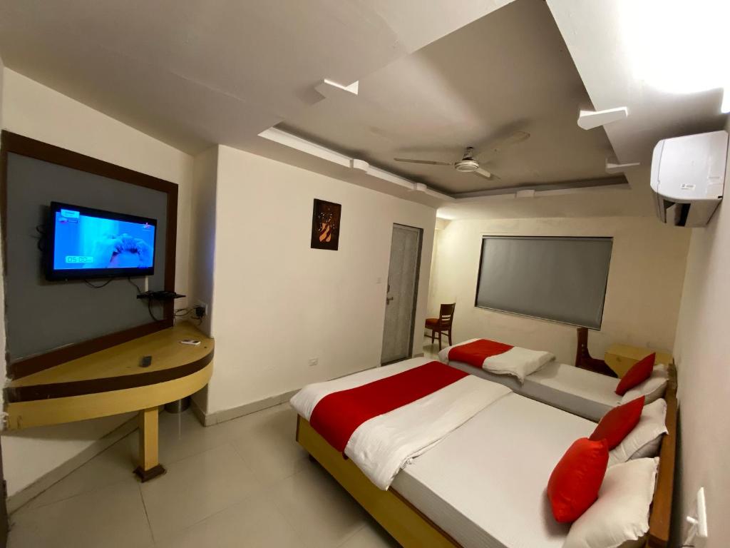 Postel nebo postele na pokoji v ubytování Hotel Riverfront