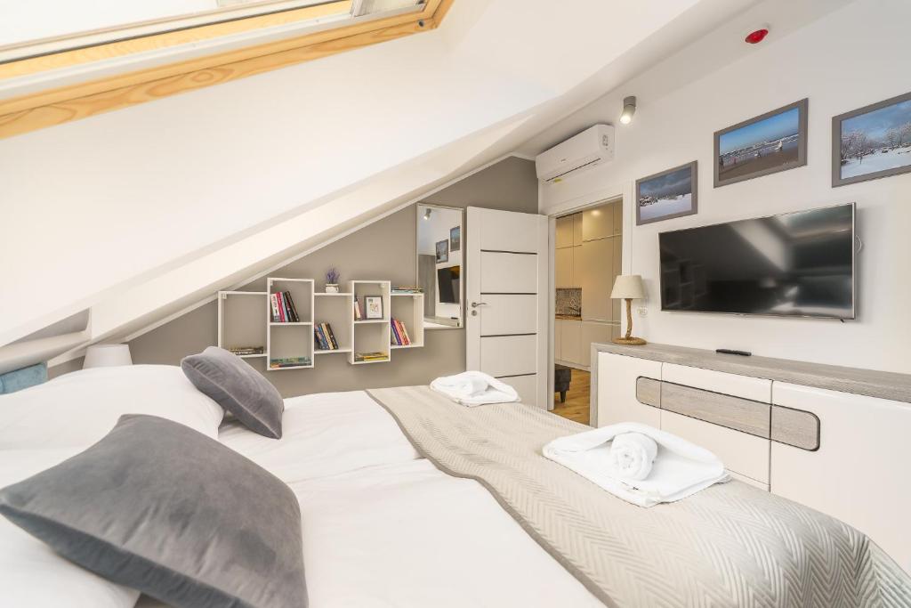 Posteľ alebo postele v izbe v ubytovaní Sunset Resort II, Nadmorska 104