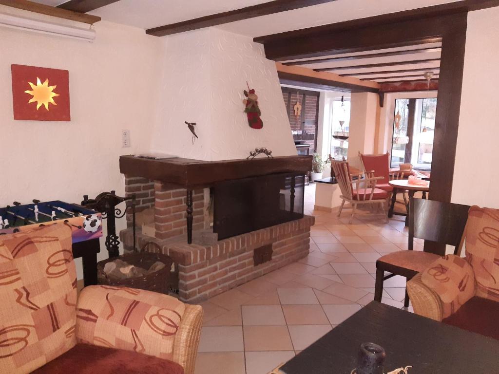 Posezení v ubytování Pension & Ferienhaus Latröpchen