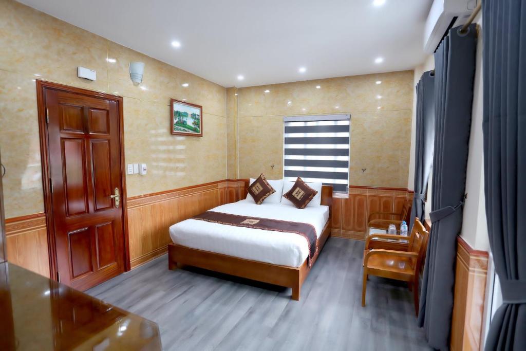 Postelja oz. postelje v sobi nastanitve HoaCuong Hotel