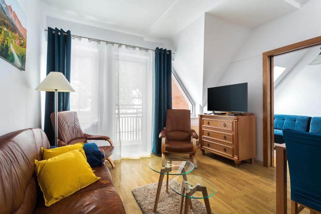 Televízia a/alebo spoločenská miestnosť v ubytovaní Rent like home - Arkadia pod Nosalem