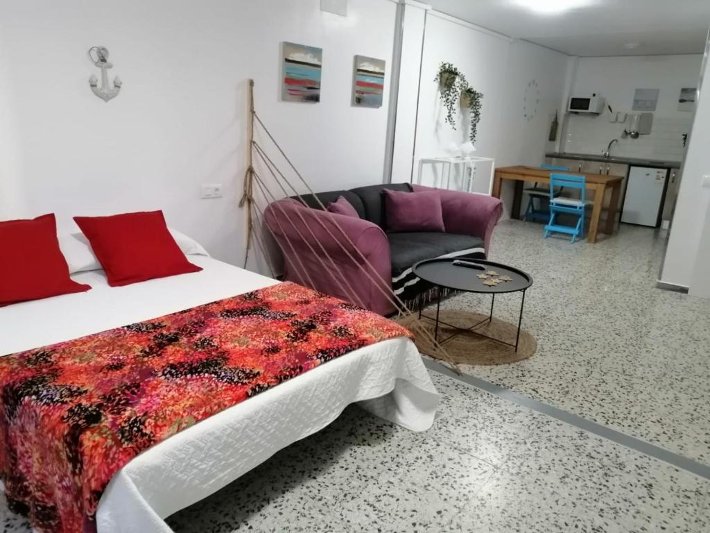 Postel nebo postele na pokoji v ubytování Pensión Playa