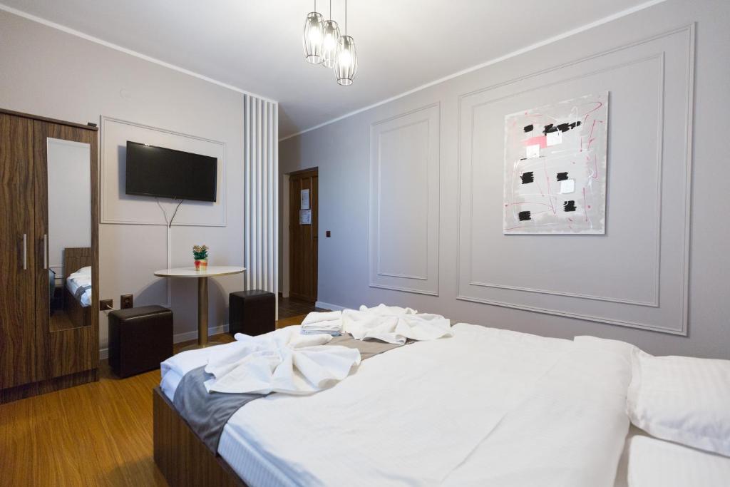 Katil atau katil-katil dalam bilik di Complex Veverița Rânca