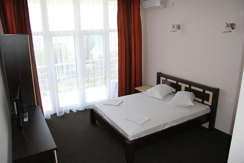 Postel nebo postele na pokoji v ubytování Berizka Park Hotel