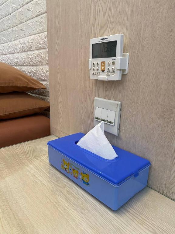 Postel nebo postele na pokoji v ubytování Hotel Pesona Merak
