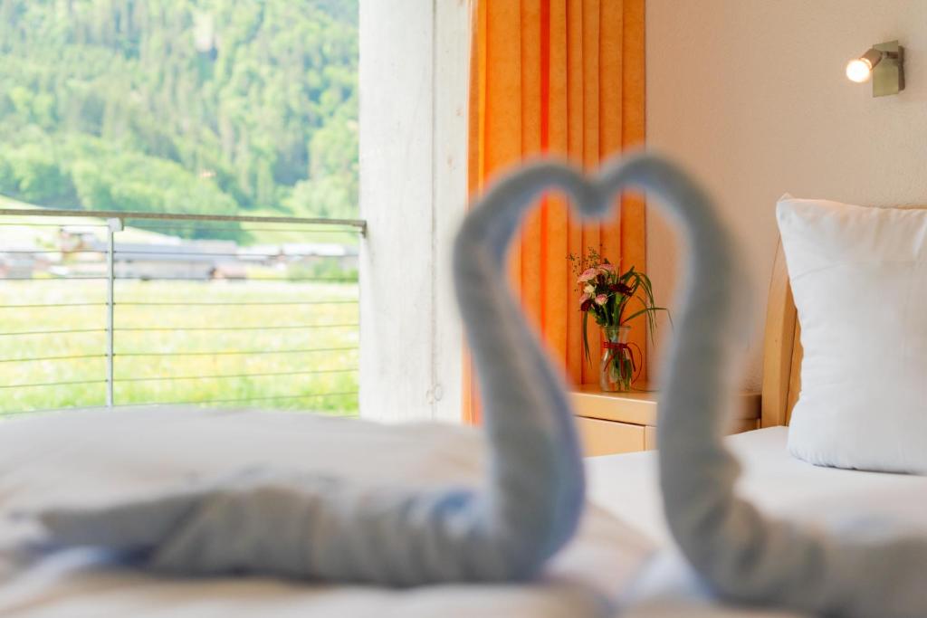 Postel nebo postele na pokoji v ubytování Apartments Susanne