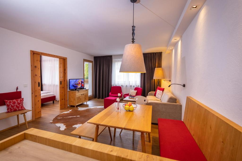 TV a/nebo společenská místnost v ubytování Hapimag Ferienwohnungen Zell am See