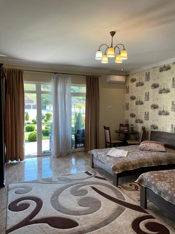 Postel nebo postele na pokoji v ubytování Hotel Ashad