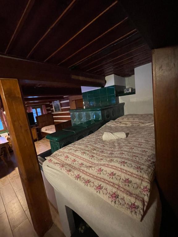 Postel nebo postele na pokoji v ubytování Hepnarova Bouda