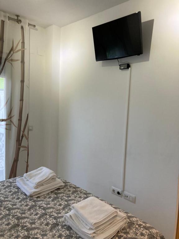 Postel nebo postele na pokoji v ubytování APARTAMENTO PINAPLAYA