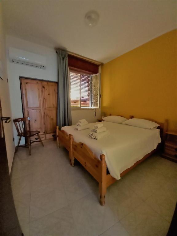 A bed or beds in a room at Case Pescatori