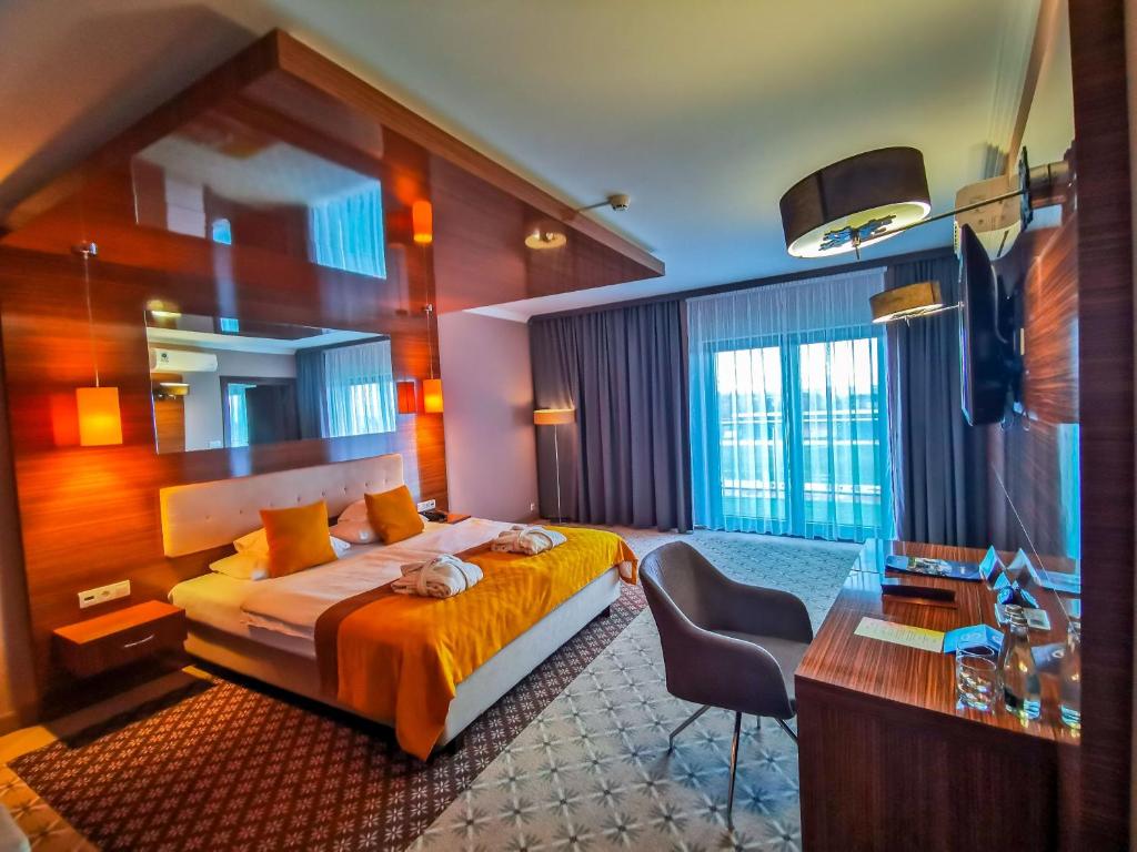 Posteľ alebo postele v izbe v ubytovaní Hotel Mistral Sport