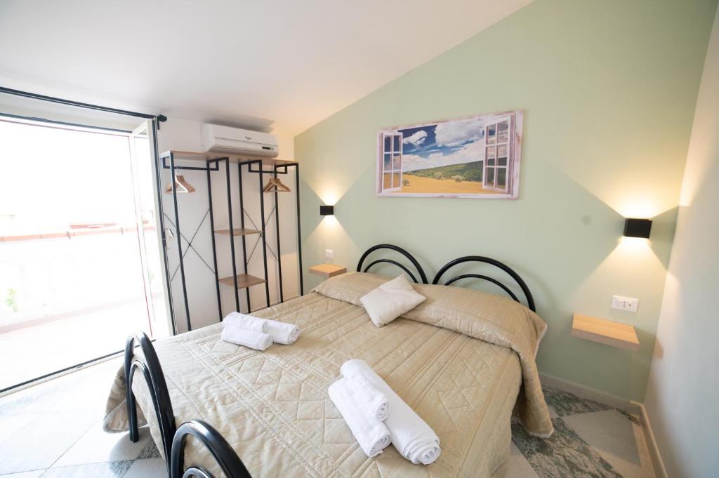 Postel nebo postele na pokoji v ubytování B&B Belvedere