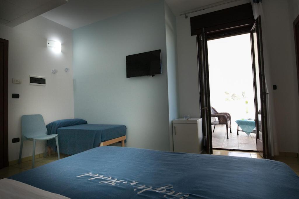 TV a/nebo společenská místnost v ubytování Gigli Hotel Salento