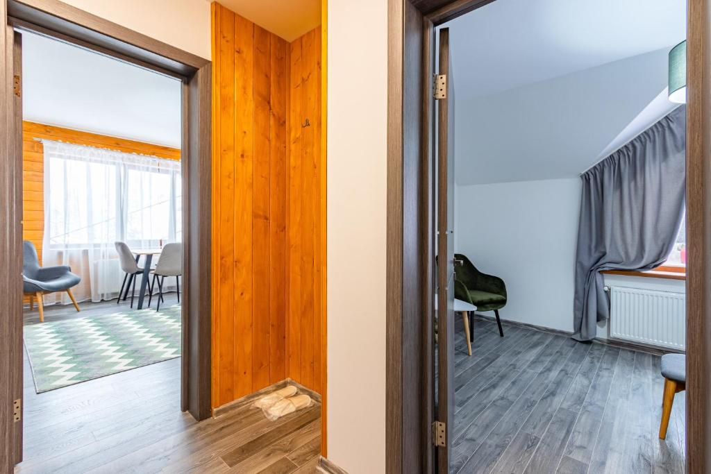 Posezení v ubytování Konopka Forest Home & SPA