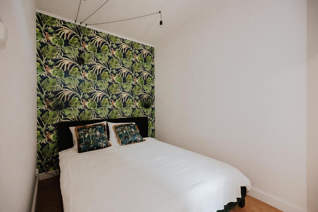 Posteľ alebo postele v izbe v ubytovaní Apartament Rynek Więzienna