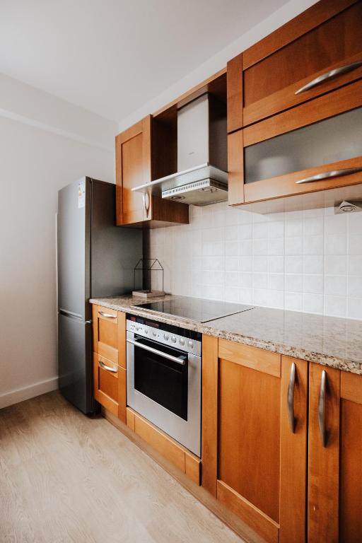 Kuchyňa alebo kuchynka v ubytovaní Apartament Rynek Więzienna