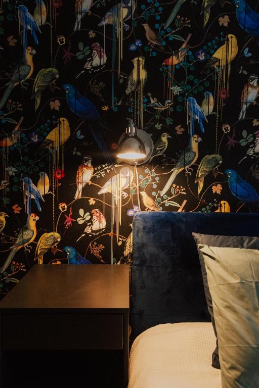 Posteľ alebo postele v izbe v ubytovaní Apartament Rynek Więzienna
