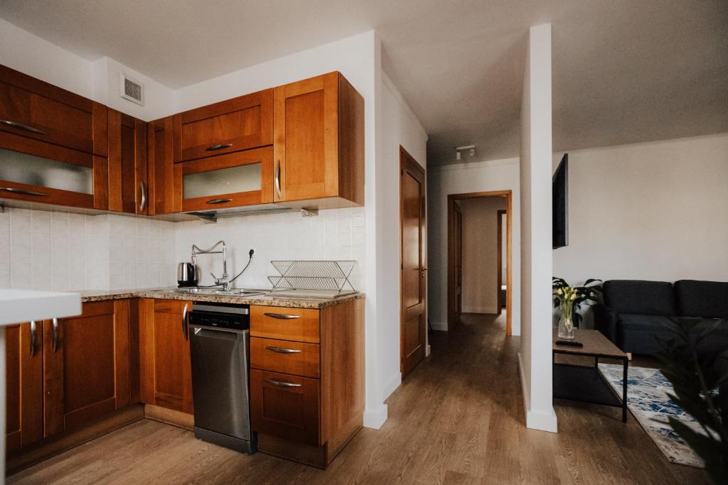 Kuchyňa alebo kuchynka v ubytovaní Apartament Rynek Więzienna
